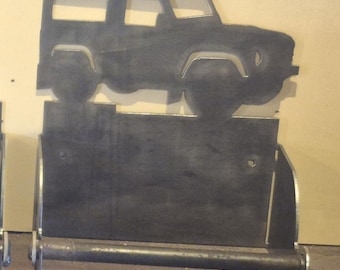 Blue roll holder with 4x4 jeep silhouette