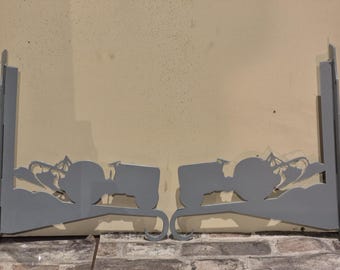 Tractor and plough hanging basket brackets