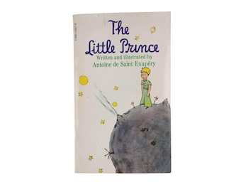 El Principito de Antoine de Saint Exupéry, edición de bolsillo clásica con trompeta, libro ilustrado clásico.