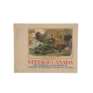 May include: Vintage Canada, The National Association of Antique Automobile Clubs of Canada, is printed on a tan card with a green 1925 Ford Model AA truck driving through a forest scene.