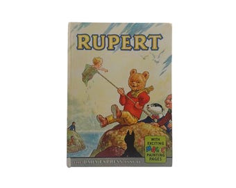 Libro de cómics infantiles con páginas de pintura mágica anual del Daily Express de Rupert