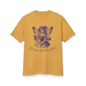 Unisex Faded Mustard Vintage Style Retro Fairy Grunge T-Shirt featuring a Purple Winged Fairy and the sarcastic saying Beware the Mischief in this cute whimsical nature shirt for fairy lovers