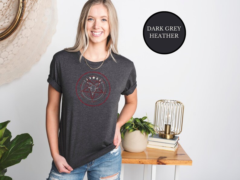 blonde witch wearing gray goth Satanic witch shirt that features Baphomet, moon phases, magical circles, and a pentagram for the ultimate gift for a witch or a fan of witch horror.