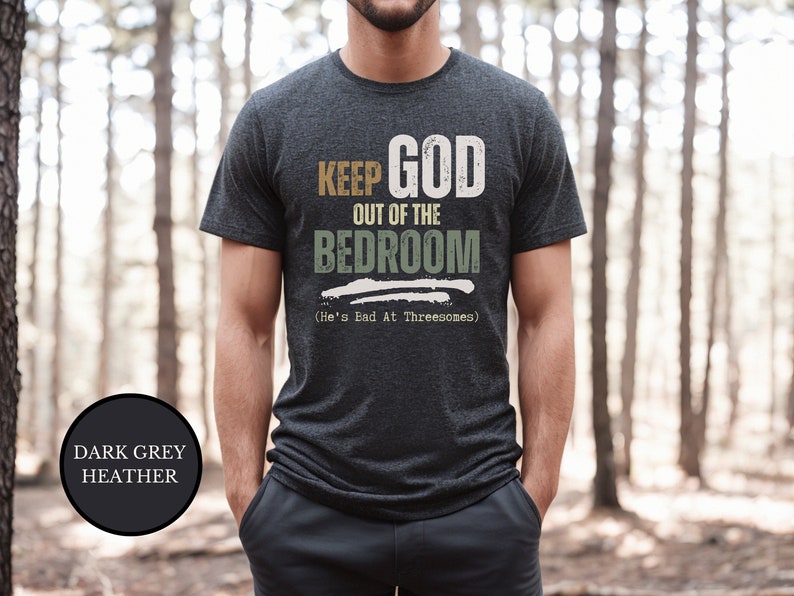 Young Christian Man Wearing a sarcastic shirt that says Keep God Out Of The Bed Room - He's Bad At Threeways - retro vintage style asthetic