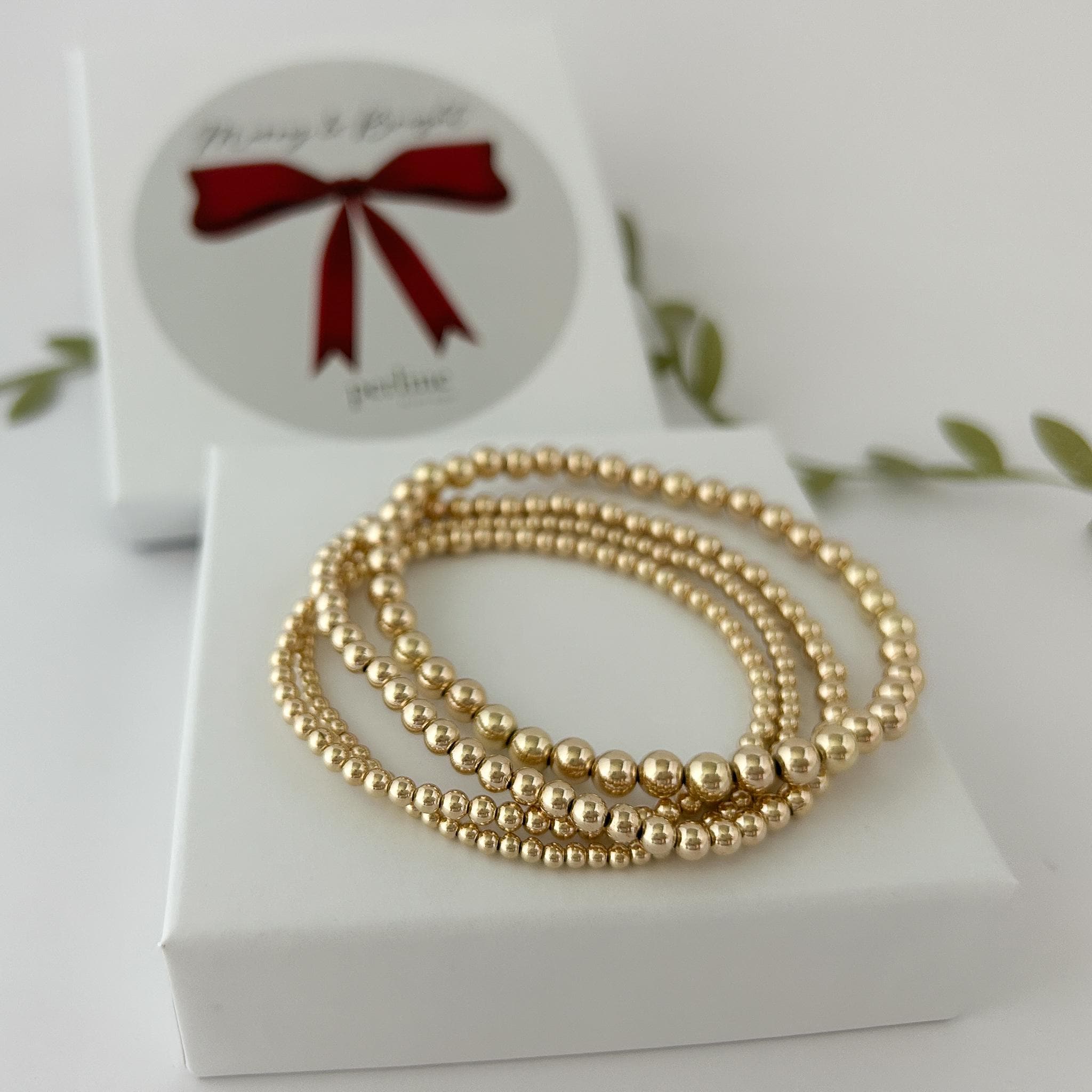 Set di 5 braccialetti elastici con perline dorate da 3 mm resistenti