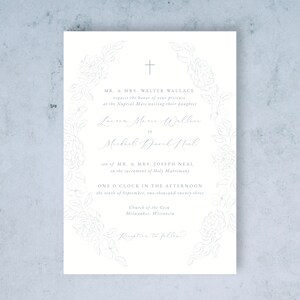 May include: A wedding invitation with a light blue background and floral design. The invitation reads "MR. & MRS. WALTER WALLACE request the honor of your presence at the Nuptial Mass uniting their daughter Lauren Marie Wallace to Michael David Neal son of MR. & MRS. JOSEPH NEAL in the sacrament of Holy Matrimony ONE O'CLOCK IN THE AFTERNOON the tenth of September, two-thousand twenty three Church of the Gesu Milwaukee, Wisconsin Reception to follow"