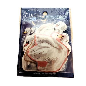 May include: A clear plastic package containing multiple die-cut paper stickers featuring watercolor illustrations of white swans. The packaging displays the text "CIAO!" in a speech bubble at the top and "Let's enjoy our lives together." at the bottom.