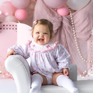 Pink Bow Smocked "ONE" Romper: First Birthday Girl Outfit