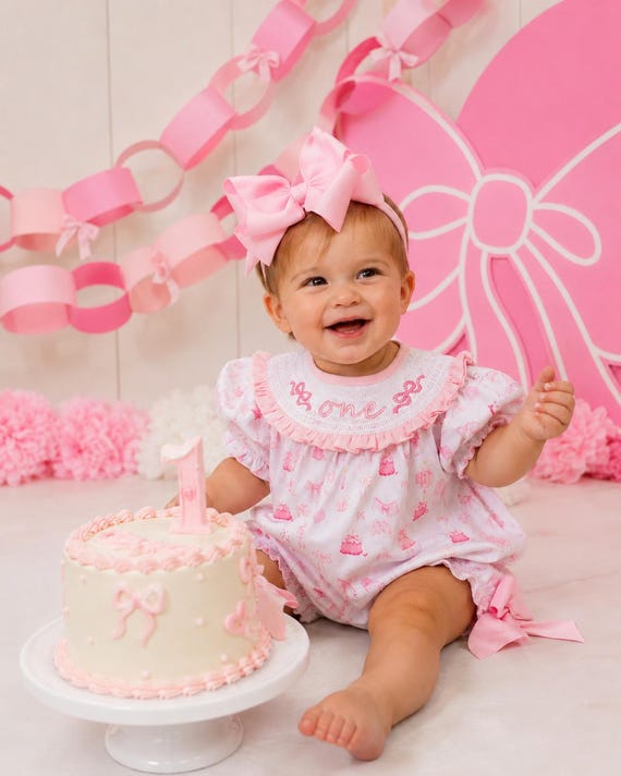 Pink Bow Smocked "ONE" Romper: First Birthday Girl Outfit