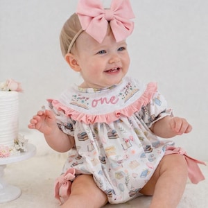 One for the Books First Birthday Romper: Girls Smocked Pink Floral Outfit