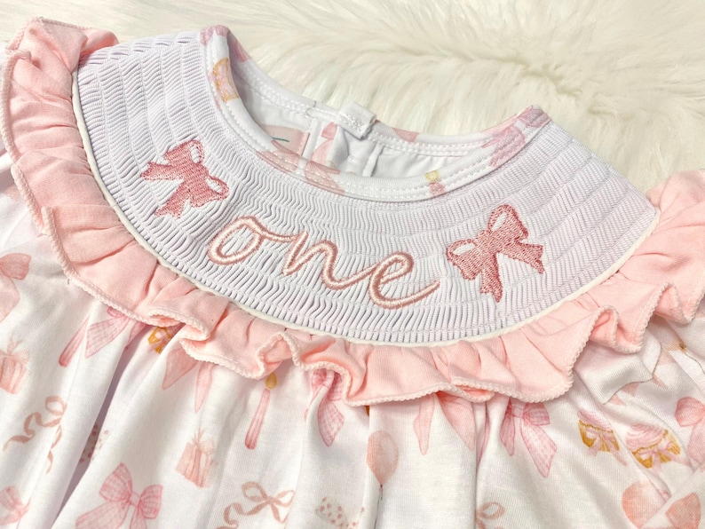 fancy one pink bow first birthday girl romper pink and white outfit, pink white smocked bubble romper first birthday winter bows ruffle bows  embroidered smocked long sleeve 1st birthday outfit romper baby girls