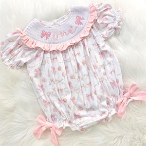 coquette girls just wanna have fun pink bow first birthday girl romper pink and white outfit, pink white smocked bubble romper first birthday winter bows ruffle bows  embroidered smocked long sleeve 1st birthday outfit romper baby girls, the mod mango baby boutique co