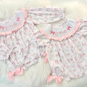 pink bow first birthday girl romper pink and white outfit, pink white smocked bubble romper first birthday winter bows ruffle bows  embroidered smocked long sleeve 1st birthday outfit romper baby girls