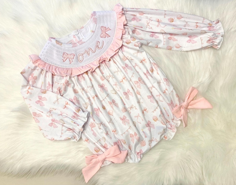 pink bow first birthday girl romper pink and white outfit, girsl just want to be one pink white smocked bubble romper first birthday winter bows ruffle bows  embroidered smocked long sleeve 1st birthday outfit romper baby girls
