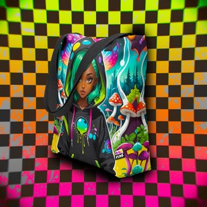 May include: A black tote bag with a colorful illustration of a woman with green hair and a black hoodie. The illustration is surrounded by mushrooms and a forest scene. The bag has the text "Rebel Punk" on it.