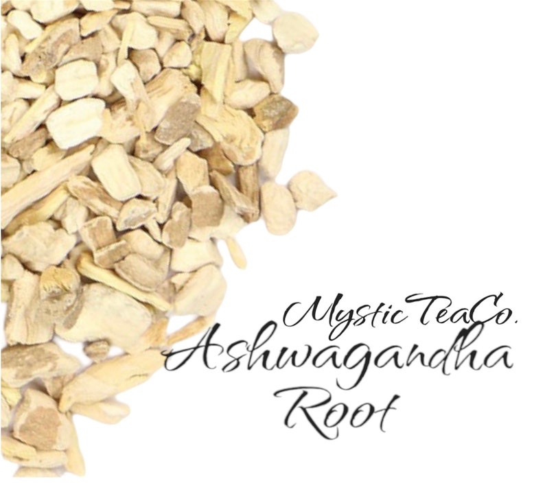 May include: Close-up of dried ashwagandha root pieces. The pieces are light brown and beige in color. The text "Mystic TeaCo. Ashwagandha Root" is written in black cursive script.