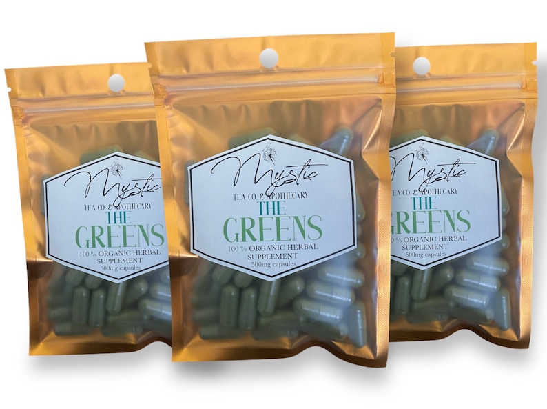 May include: Three gold foil pouches containing green capsules labeled "Mystic Tea Co & Apothecary The Greens 100% Organic Herbal Supplement 500mg capsules".