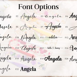 May include: Image showcasing 22 font options for the name "Angela". The fonts vary in style, from elegant cursive to bold block letters. The text "Font Options" is at the top. The image is on a light background.