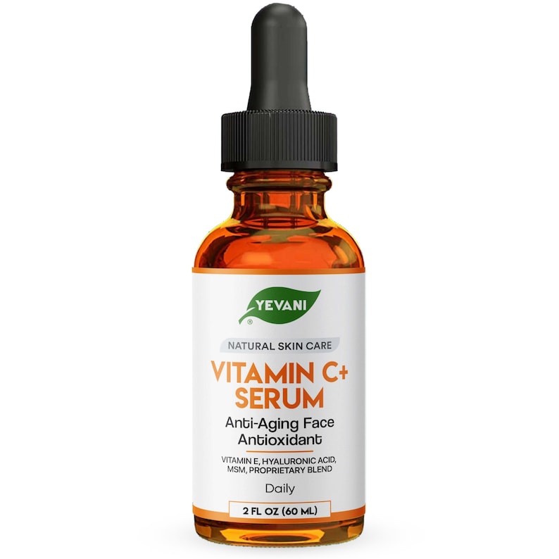 May include: A clear glass bottle of Vitamin C+ Serum with a black dropper. The label reads "Yevani Natural Skin Care" and lists ingredients. The bottle contains 60 ml of serum, designed as an anti-aging face antioxidant.