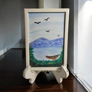 Pintura de un lago en acuarela