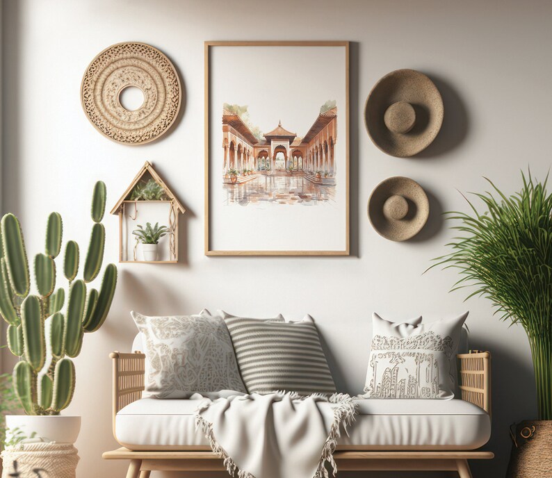 Pode incluir: Um design de interior de sala de estar com um sof&aacute; branco, duas almofadas, um cobertor e uma planta de cacto em um vaso. A parede atr&aacute;s do sof&aacute; tem uma pintura de aquarela emoldurada de um arco com um piso de ladrilhos e um teto de madeira. H&aacute; tamb&eacute;m tr&ecirc;s decora&ccedil;&otilde;es de parede.