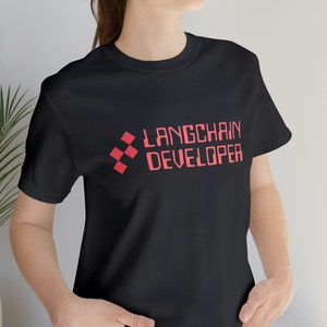 May include: A black t-shirt with a red graphic that says "LangChain Developer" and a red pixelated square design.