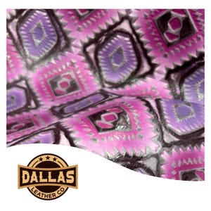 May include: Close-up of a patterned leather material. The design features repeating geometric shapes in shades of pink, purple, and gray. The Dallas Leather Co. logo is visible in the bottom left corner.
