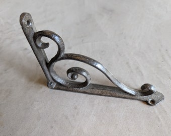 Set of 2 cast iron shelf brackets, brown, vintage design.