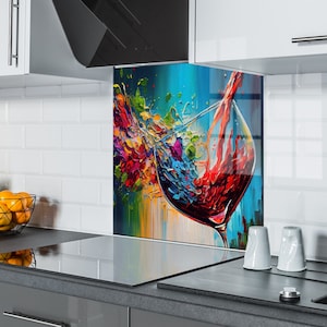May include: A colourful abstract painting of a glass of red wine being poured. The glass is in the foreground and the wine is splashing out of the glass. The background is a blue and green abstract design.