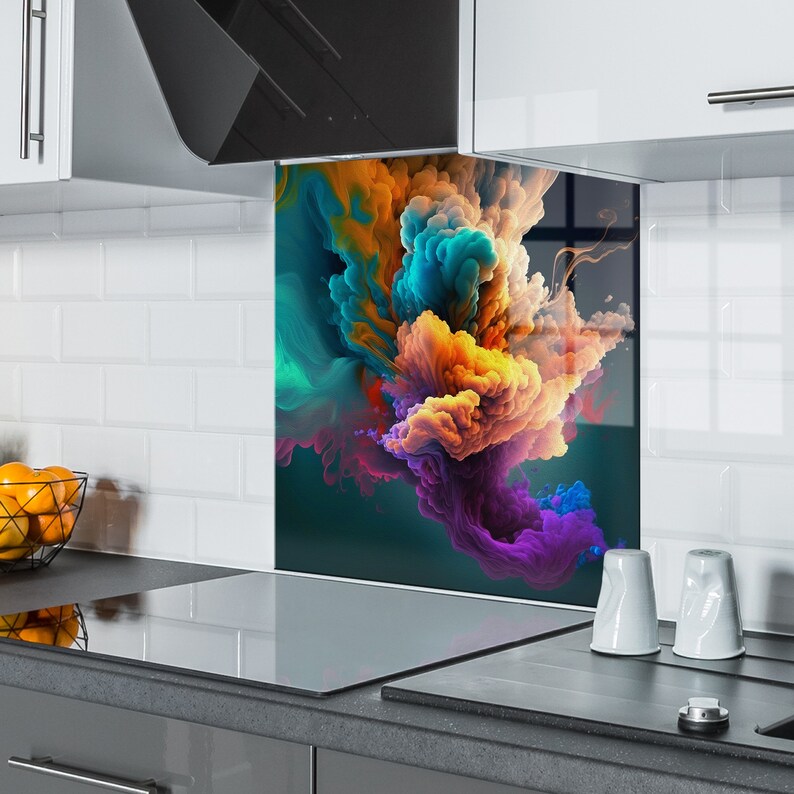 May include: Abstract kitchen backsplash with a colorful design of swirling clouds in shades of orange, yellow, blue, purple, and pink. The backsplash is installed behind a stainless steel stovetop.