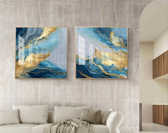 Conjunto de 2 cuadros abstractos de inspiración oceánica: impresiones en mármol azul y dorado.