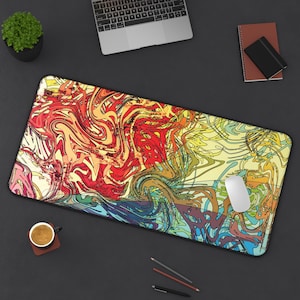 May include: A white ceramic mug with a black handle and the text "But First, Coffee" in a black, handwritten-style font. The mug is on a white surface.