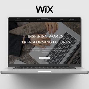 Könnte beinhalten: Der Bildschirm eines Laptops zeigt eine Website mit dem Text "Inspiring Women Transforming Futures" und einem Call-to-Action zum "Book Consultation". Die Website ist für ein Unternehmen, das Social-Media-Planungs- und Interaktionsdienste anbietet.