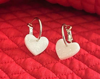 Hoop earrings with sparkly white heart