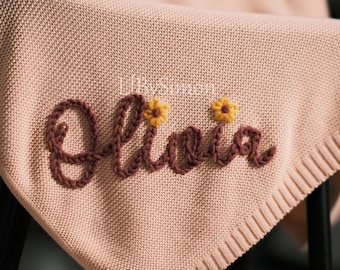 Personlig babyfilt: Handbroderad ekologisk bomullsstickning