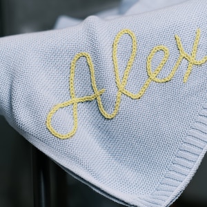 Wrap Your Little One in Warmth and Love with Our Hand-Embroidered Personalized Knit Baby Blanket A Custom Name Swaddle Blanket image 1