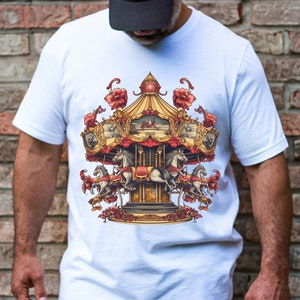 May include: A white t-shirt featuring a colourful illustration of a carousel with horses and flowers.