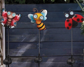 Luz solar LED intermitente para jardín con forma de mariposa, abeja o mariquita, de metal, 78 cm.