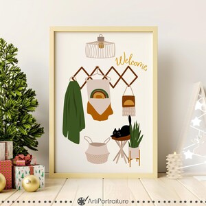 May include: A framed print with a welcome sign, a black cat, a hanging rack with a green scarf, a woven basket, and a potted plant. The print has a boho style.