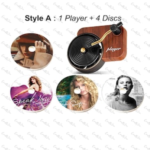 There are a records player and 4 vinyl air freshener with 4 discs Taylor Swift albums cover which are Speak Now,Red (Taylor’s Version),Reputation
 and Taylor Swift