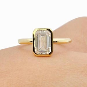 1.5 Carat IGI Certified Elongated Emerald Cut Lab Grown Diamond Bezel Set Solitaire Engagement Ring 14k Yellow Gold Art Deco Diamond Ring