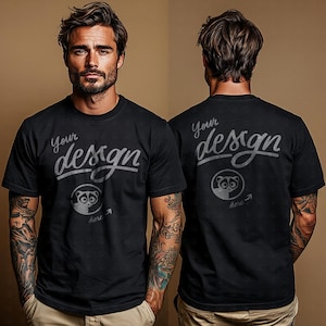 May include: Two men wearing black t-shirts with the text "Your design here" printed on the front and back. The shirts feature a small graphic of a lemur.
