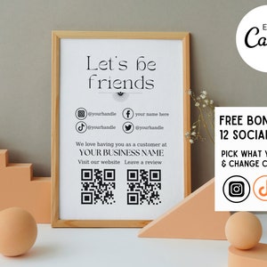 Pode incluir: Um sinal imprimível com o texto "Let's be friends" e ícones de mídia social. O sinal também inclui dois códigos QR e o texto "We love having you as a customer at YOUR BUSINESS NAME. Visit our website. Leave a review."
