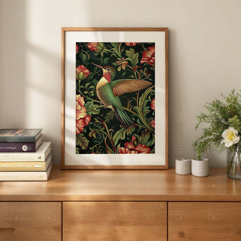 May include: A framed print of a hummingbird with green and yellow feathers flying over a dark green background with red flowers.