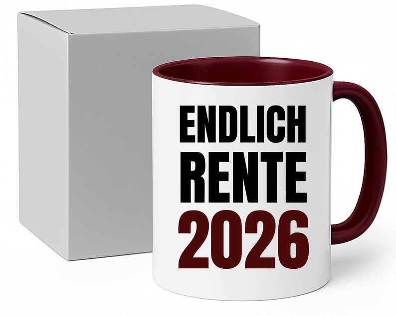 May include: White ceramic mug with a burgundy interior and handle. The mug features the text "ENDLICH RENTE 2026" in black and burgundy. A white box is next to the mug.