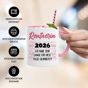 May include: A white ceramic mug with a pink interior and handle. The mug features the word "Rentnerin" in pink script, the year "2026", and the phrase "ICH HABE SEHR LANGE F&Uuml;R DIESE TASSE GEARBEITET!" in German. A red and white striped straw is in the mug.