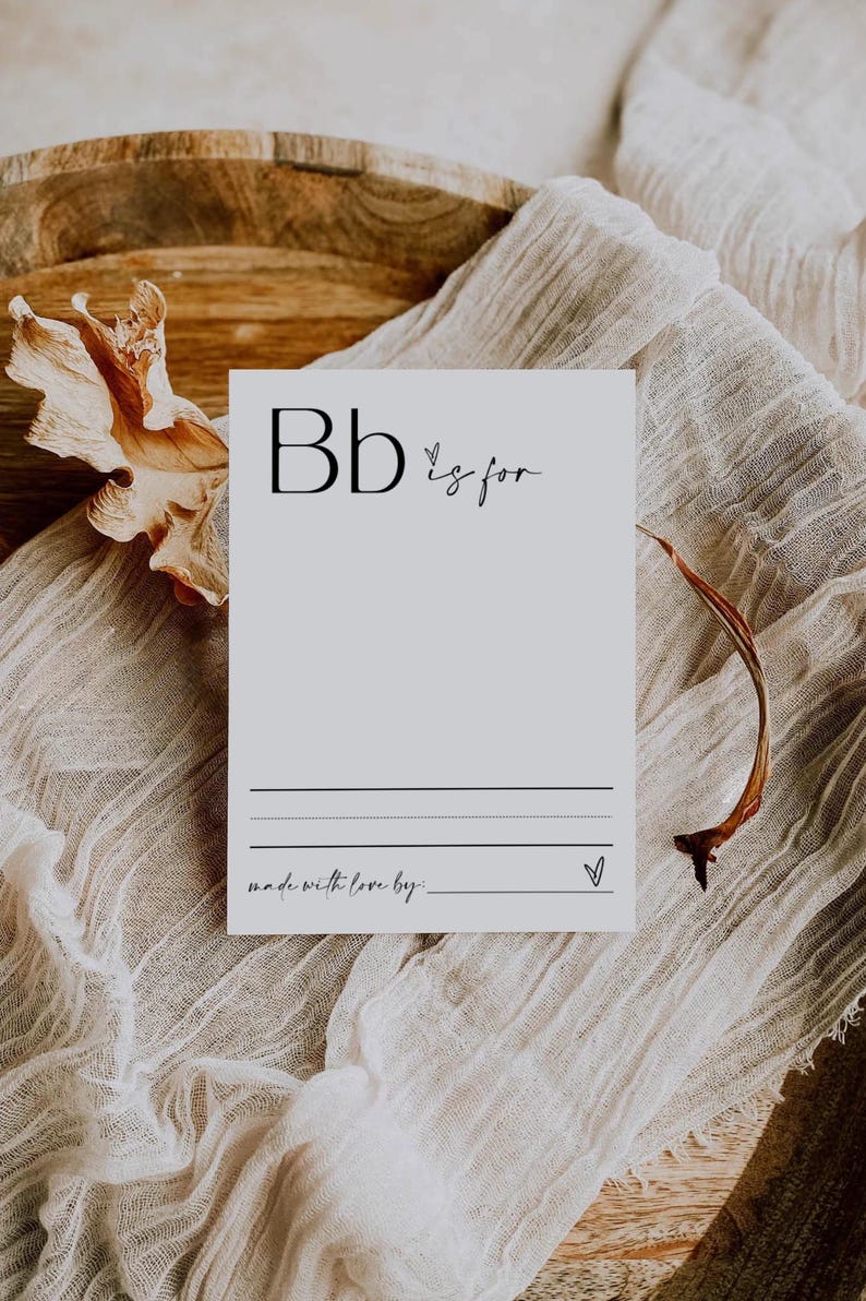 May include: A white card with the letter "B" in black and the text "B is for" in black cursive. The card has a line for writing and the text "made with love by:" at the bottom.