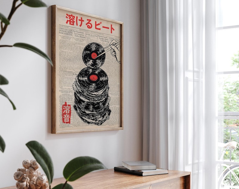 May include: A vintage-style poster with a stack of vinyl records, a hand holding chopsticks, and the Japanese text "Soup Beat".