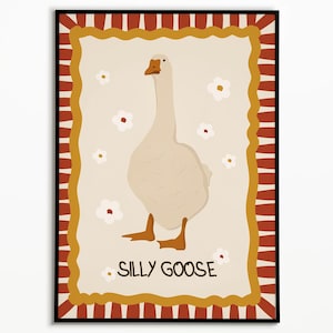 May include: A white goose with an orange beak and feet stands on a beige background with white flowers. The background is framed by a red and yellow striped border with a wavy edge. The text "Silly Goose" is written in black below the goose.