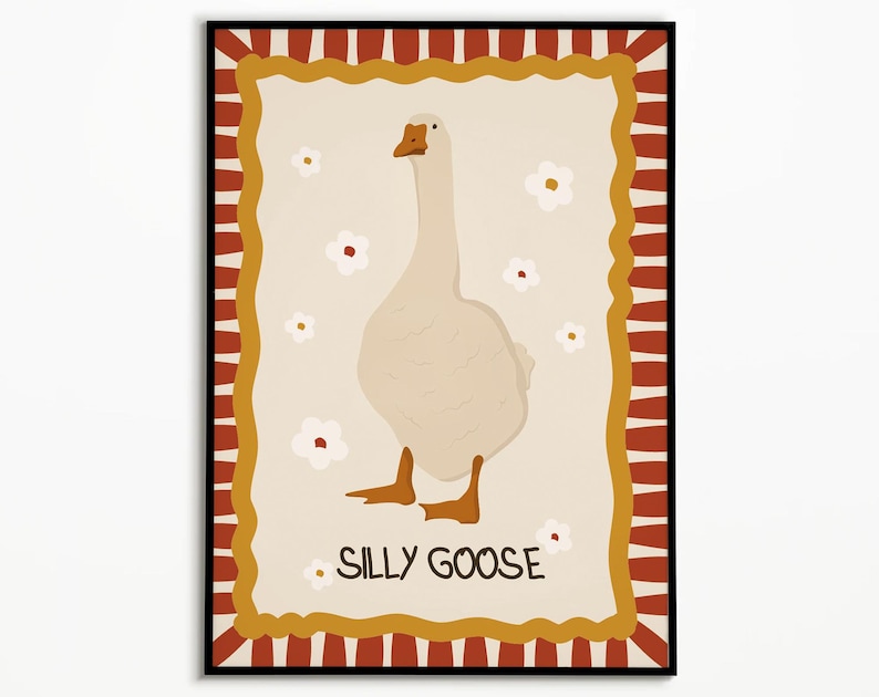 May include: A white goose with an orange beak and feet stands on a beige background with white flowers. The background is framed by a red and yellow striped border with a wavy edge. The text "Silly Goose" is written in black below the goose.